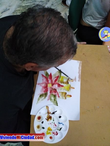 Joel Ramos en el Dia Munidal Pintor Boca y Pie